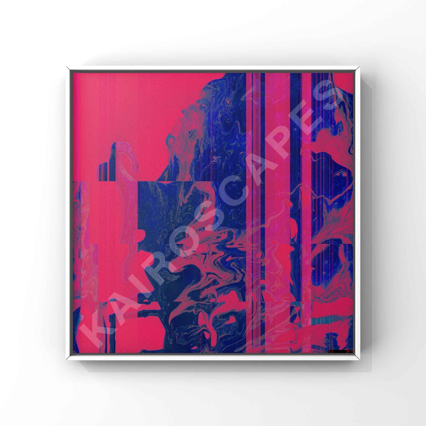 Mockup of a modern white-framed print displaying striking bright pink and blue glitch artwork, appealing to musicians in need of unique and visually captivating representations for their music.